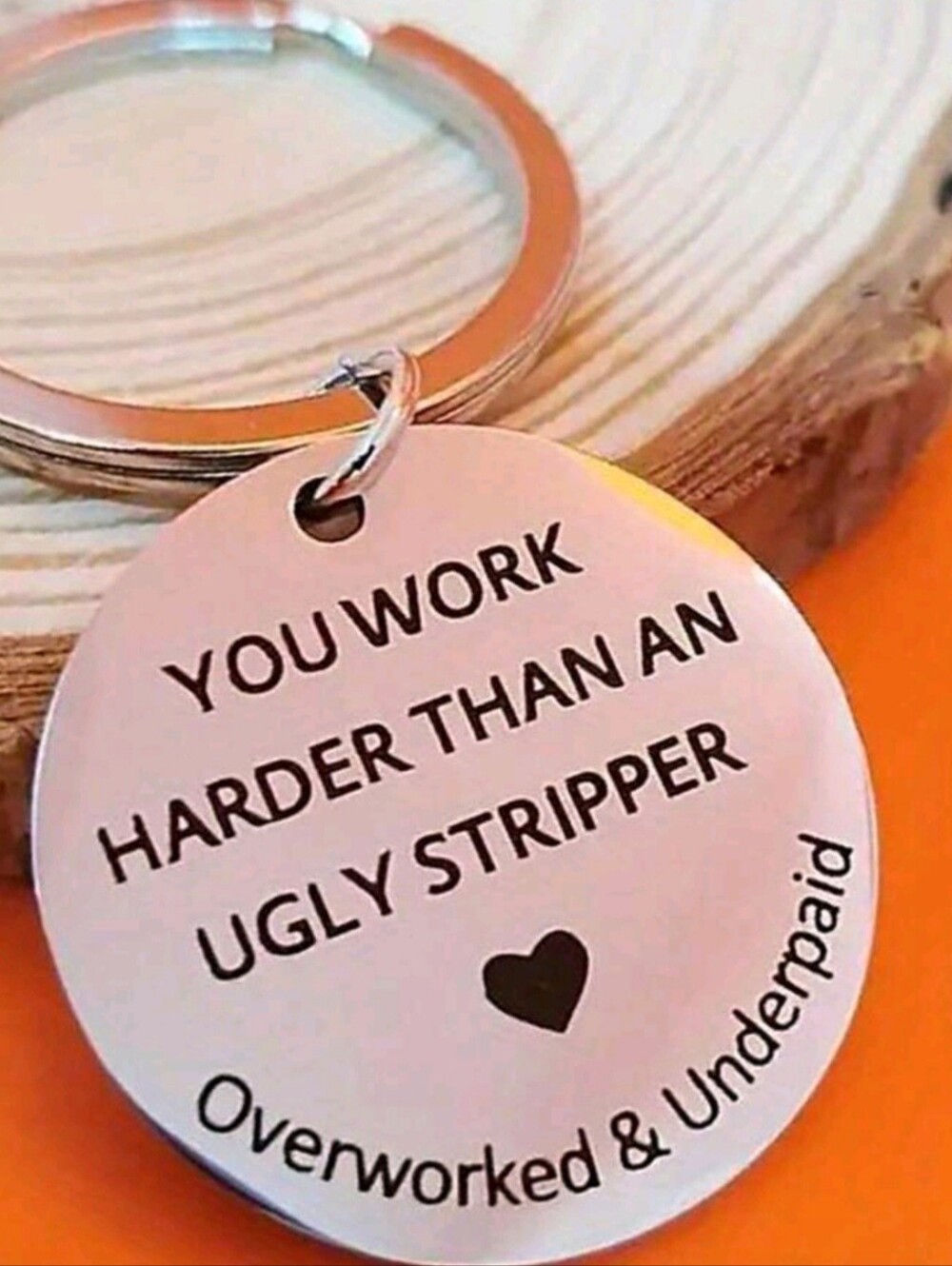 Silver Round Keychain - 'You Work Harder Than An Ugly Stripper'